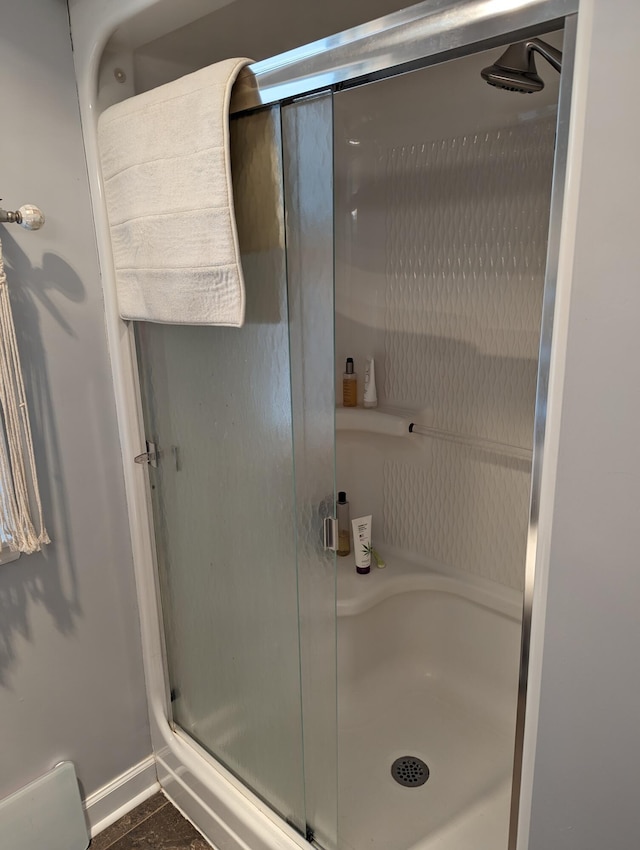 bathroom featuring a stall shower