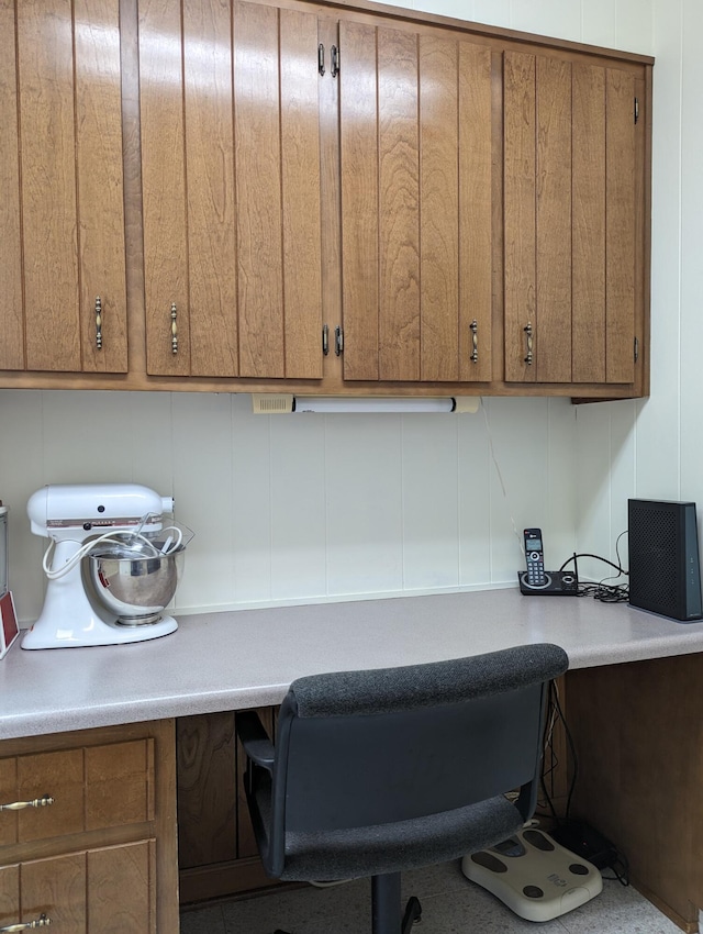 office area with built in desk