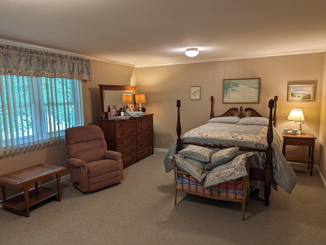 carpeted bedroom with baseboards and ornamental molding