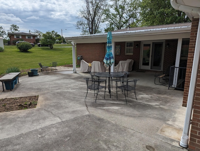 view of patio with outdoor dining area