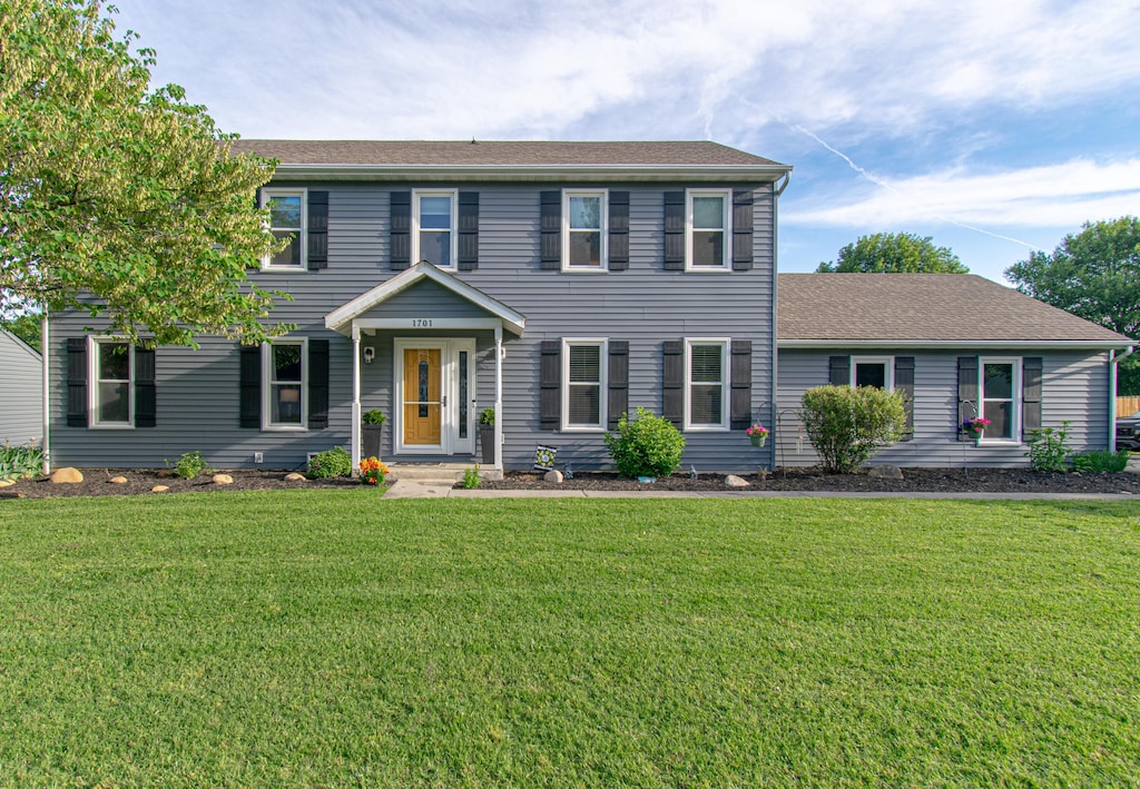 1701 Kingsmill Dr, Salem, VA 24153 - colonial-style house with a front yard and a shingled roof