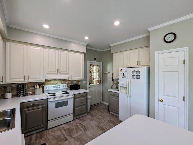 180 Daniels Run Rd NE, Copper Hill, VA 24079 - kitchen featuring white appliances, under cabinet range hood, decorative backsplash, light countertops, and white cabinets