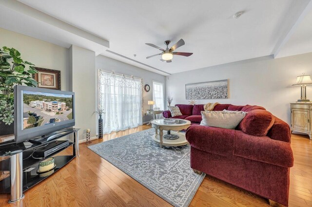 1100 Celebration Ave Unit 405, Moneta, VA 24121 - living room featuring a ceiling fan, light wood finished floors, and baseboards