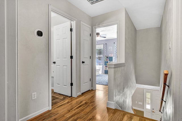 4848 Hickory Ridge Ct, Roanoke, VA 24018 - hall featuring an upstairs landing, wood finished floors, and baseboards