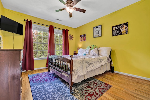 4848 Hickory Ridge Ct, Roanoke, VA 24018 - bedroom with baseboards, wood finished floors, and ceiling fan