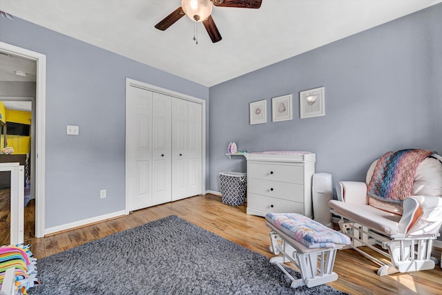 4848 Hickory Ridge Ct, Roanoke, VA 24018 - bedroom with wood finished floors, baseboards, a closet, and a ceiling fan