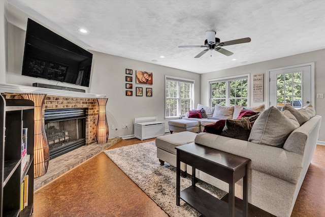 4848 Hickory Ridge Ct, Roanoke, VA 24018 - living room featuring a fireplace, ceiling fan, baseboards, and recessed lighting