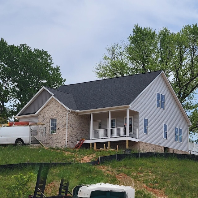 5591 Old Grove Ln, Salem, VA 24153 - view of front of home featuring covered porch, a shingled roof, and brick siding