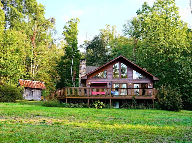 195 Lost Spring Ln, Lexington, VA 24450 - back of house with a lawn, a deck, and a storage shed