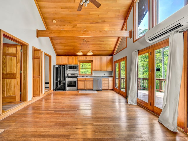 195 Lost Spring Ln, Lexington, VA 24450 - kitchen with wood ceiling, a wall unit AC, a sink, high vaulted ceiling, and stainless steel appliances