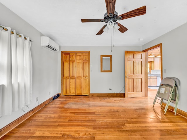 195 Lost Spring Ln, Lexington, VA 24450 - interior space featuring light wood finished floors, baseboards, a ceiling fan, and a wall mounted AC