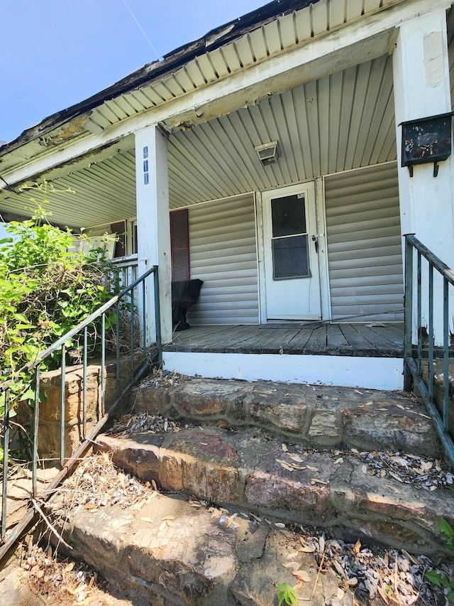 doorway to property with a porch