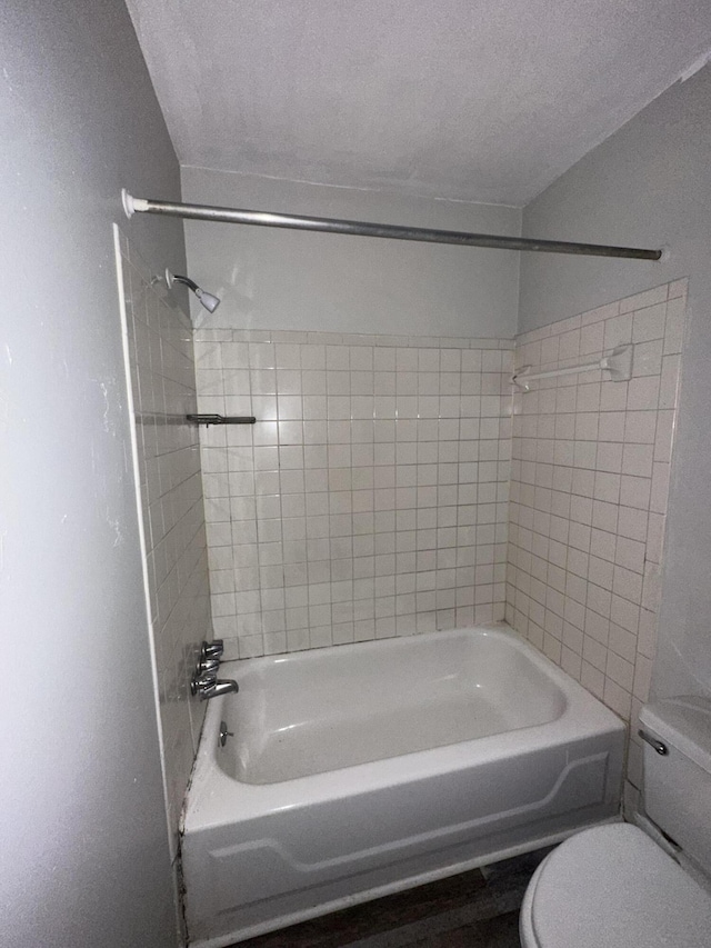 full bath featuring shower / bathing tub combination and toilet