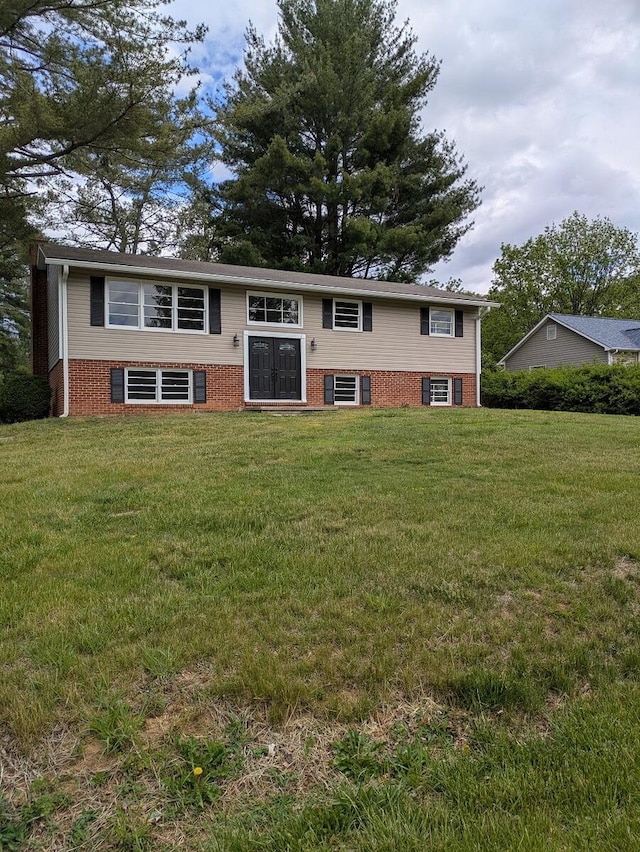 58 Lakeland Cir, Troutville, VA 24175 - raised ranch featuring a front lawn and brick siding