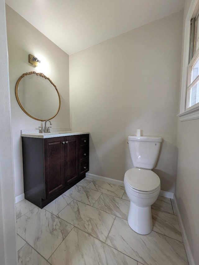 58 Lakeland Cir, Troutville, VA 24175 - half bathroom with vanity, toilet, baseboards, and marble finish floor