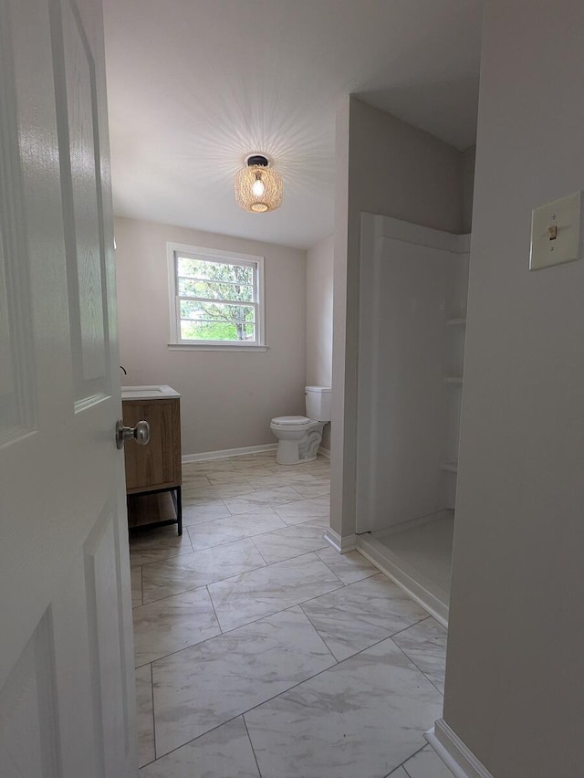 58 Lakeland Cir, Troutville, VA 24175 - full bath featuring toilet, marble finish floor, walk in shower, baseboards, and vanity