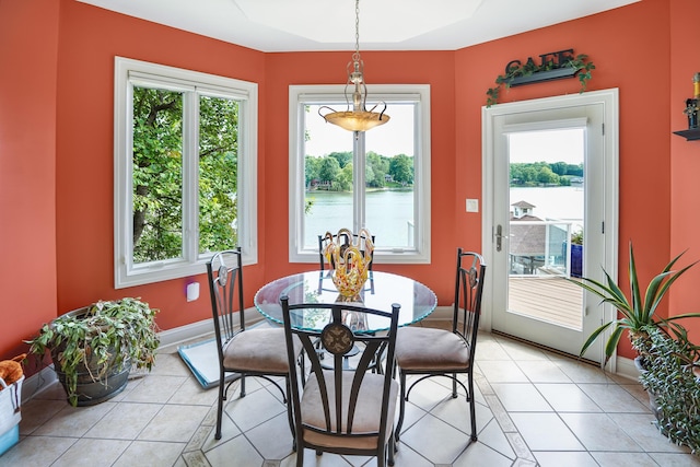 2580 Lakewood Forest Rd, Moneta, VA 24121 - dining room with plenty of natural light, light tile patterned floors, baseboards, and a water view