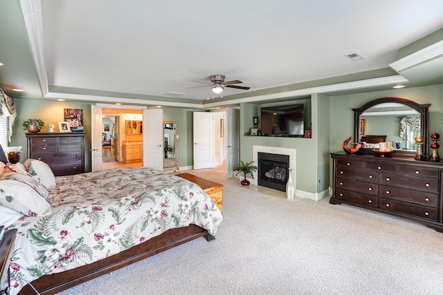 2580 Lakewood Forest Rd, Moneta, VA 24121 - carpeted bedroom featuring a fireplace, baseboards, a raised ceiling, and ceiling fan