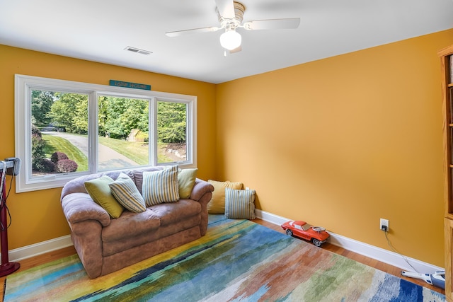 2580 Lakewood Forest Rd, Moneta, VA 24121 - living area featuring ceiling fan, baseboards, and wood finished floors