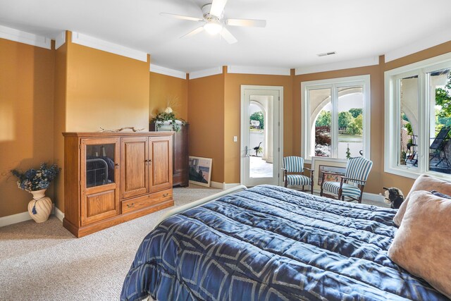 2580 Lakewood Forest Rd, Moneta, VA 24121 - bedroom with light carpet, baseboards, access to exterior, and ceiling fan