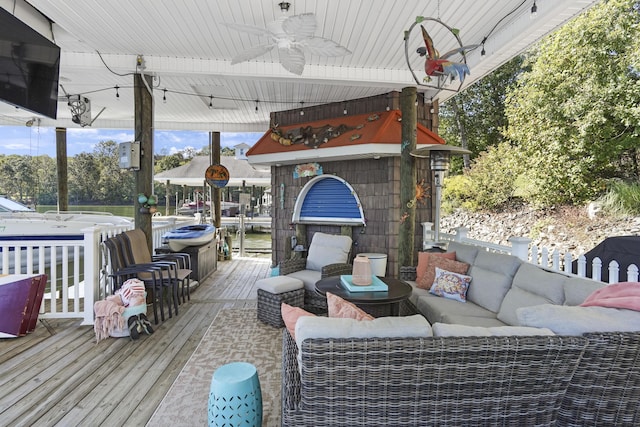 2580 Lakewood Forest Rd, Moneta, VA 24121 - wooden deck featuring an outdoor hangout area, a ceiling fan, and boat lift