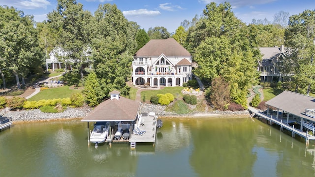2580 Lakewood Forest Rd, Moneta, VA 24121 - dock featuring boat lift, a water view, and view of wooded area
