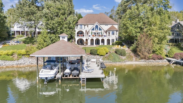 2580 Lakewood Forest Rd, Moneta, VA 24121 - dock area featuring boat lift, a water view, a balcony, and a yard