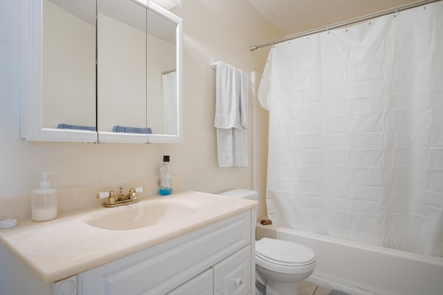 full bath with toilet, shower / tub combo with curtain, and vanity