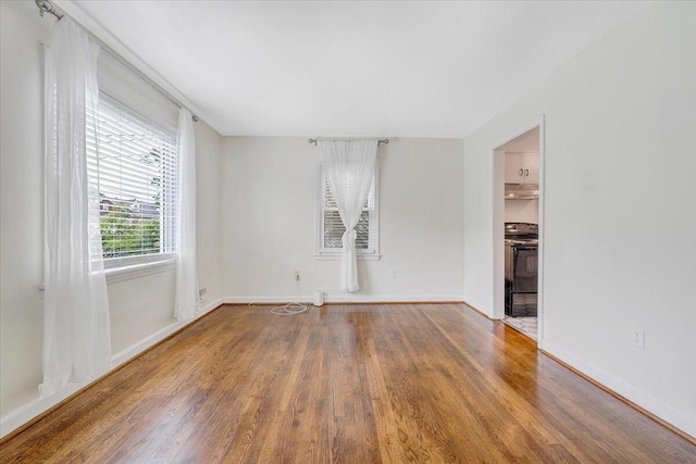 1218 Grayson Ave NW, Roanoke, VA 24017 - unfurnished room featuring wood finished floors and baseboards