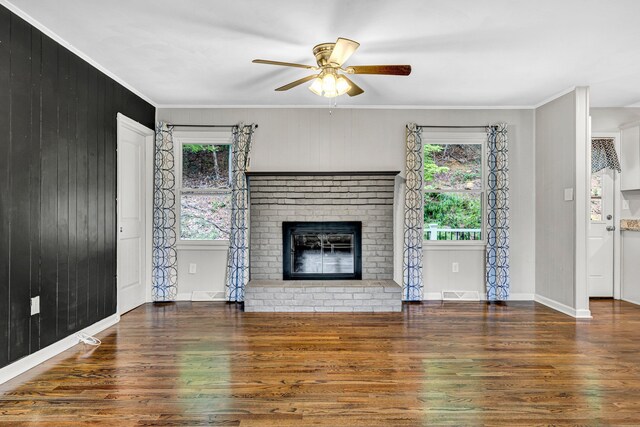 3443 Overhill Trl, Roanoke, VA 24018 - unfurnished living room featuring wood finished floors, ceiling fan, healthy amount of natural light, baseboards, and crown molding