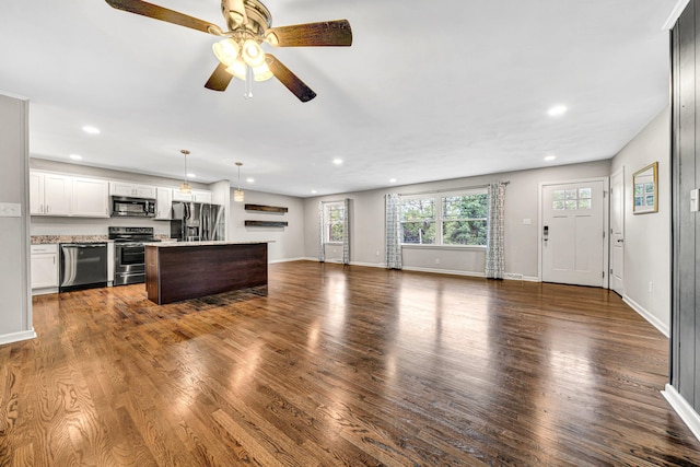 3443 Overhill Trl, Roanoke, VA 24018 - unfurnished living room featuring recessed lighting, ceiling fan, dark wood-type flooring, and baseboards