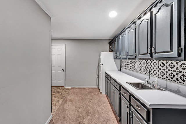 3443 Overhill Trl, Roanoke, VA 24018 - kitchen featuring a sink, baseboards, light colored carpet, light countertops, and backsplash