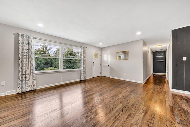 3443 Overhill Trl, Roanoke, VA 24018 - unfurnished living room with wood finished floors, baseboards, and recessed lighting