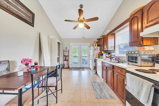 kitchen featuring white appliances, french doors, light countertops, a sink, and ceiling fan