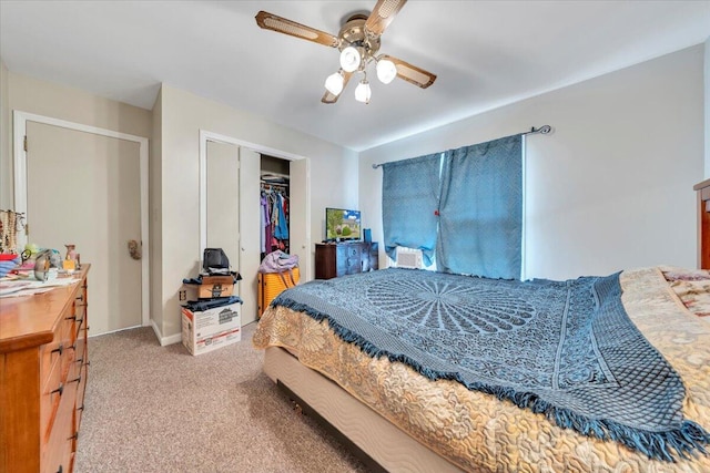 bedroom featuring carpet, a closet, ceiling fan, and baseboards