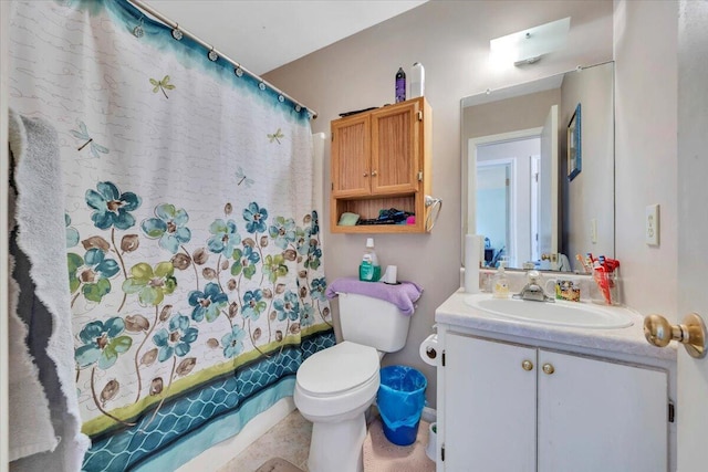 full bathroom with toilet, vanity, tile patterned flooring, and shower / bath combo