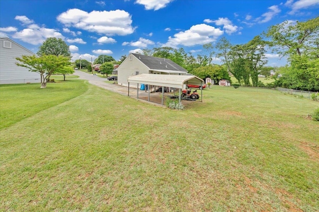 view of yard with a detached carport