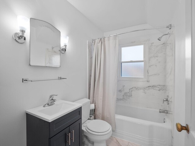 bathroom with toilet, shower / tub combo, and vanity