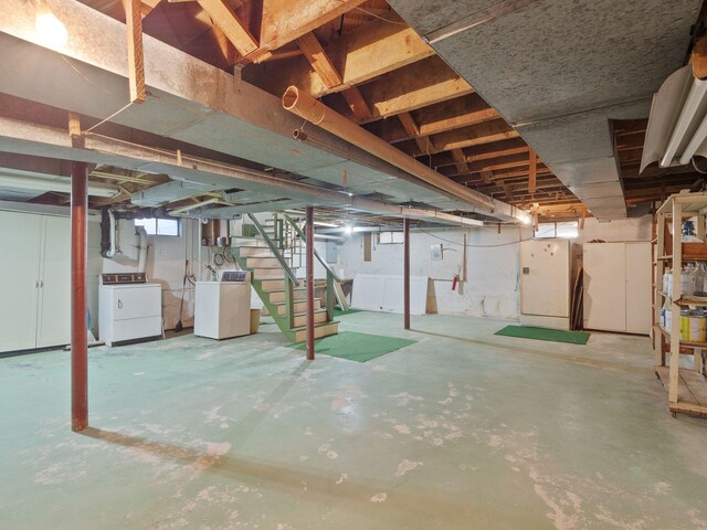 below grade area with washer and dryer and stairs