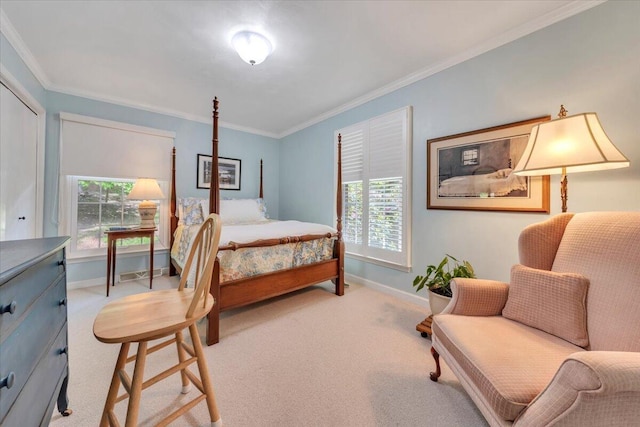 carpeted bedroom with baseboards and ornamental molding