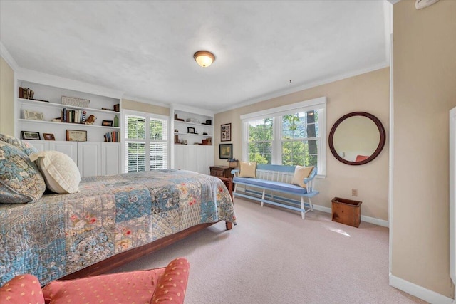carpeted bedroom featuring ornamental molding and baseboards
