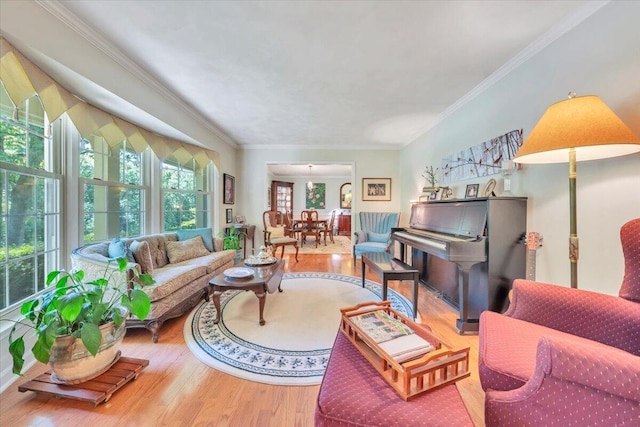 living room featuring wood finished floors and ornamental molding