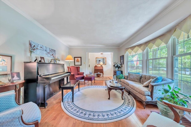 living area with light wood finished floors and ornamental molding