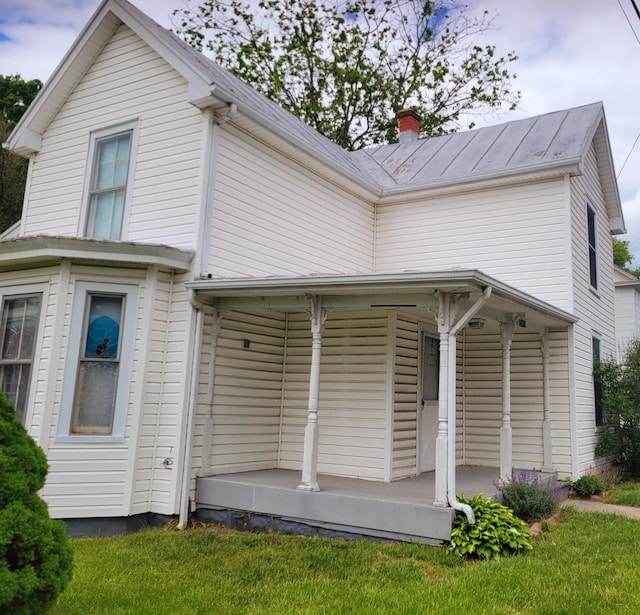 5159 Lee Hwy, Troutville, VA 24175 - view of front of property featuring a chimney, a front yard, and a porch