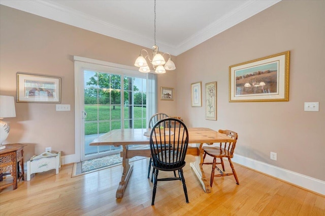 1119 Park Hall Rd, Huddleston, VA 24104 - dining space with a chandelier, crown molding, light wood finished floors, and baseboards