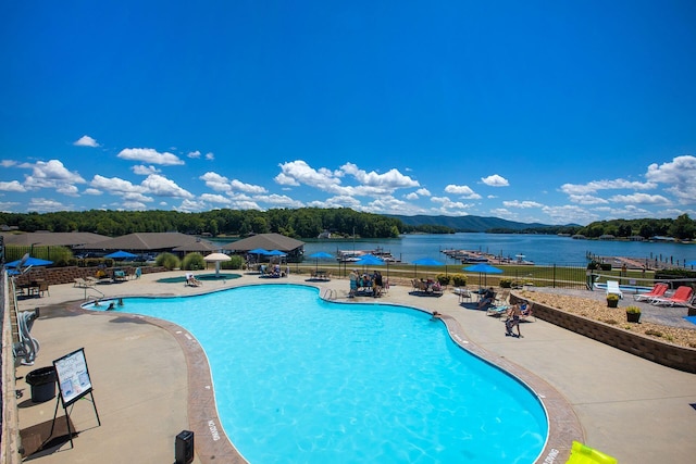 1119 Park Hall Rd, Huddleston, VA 24104 - community pool with fence, a patio area, and a water view