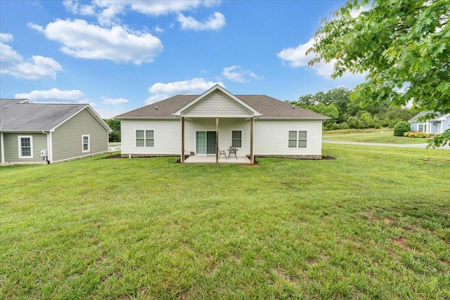 1119 Park Hall Rd, Huddleston, VA 24104 - rear view of property featuring a patio and a yard
