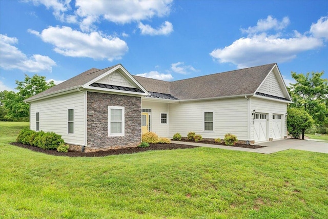 1119 Park Hall Rd, Huddleston, VA 24104 - view of front of house featuring a garage, concrete driveway, stone siding, a standing seam roof, and a front lawn