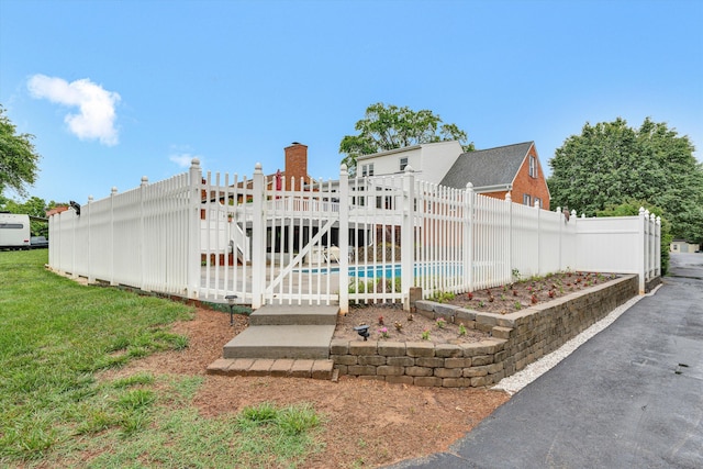back of house featuring fence