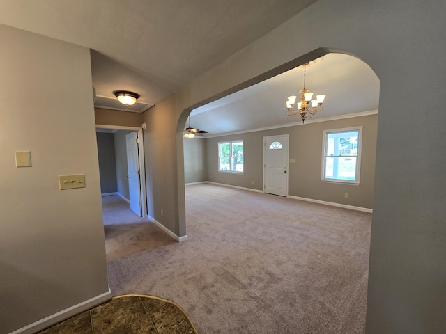411 Raleigh Ave, Vinton, VA 24179 - carpeted entrance foyer featuring arched walkways, baseboards, a ceiling fan, healthy amount of natural light, and crown molding